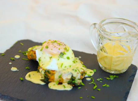 Bubble and squeak, poached egg and hollandaise sauce. by The Greedy Fox