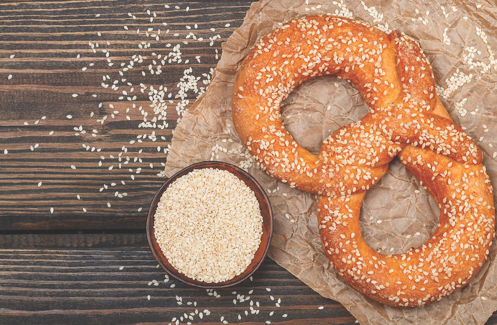 Game Day Pretzel with Sesame Seed on Wooden Table