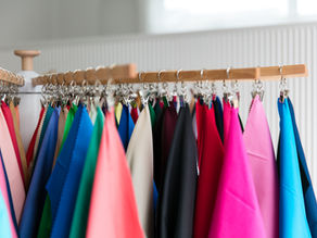 Fabric colour swatches hanging on a frame