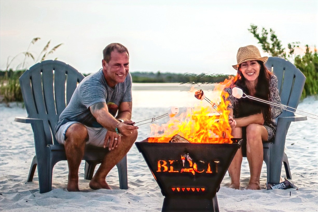 Professional beach campfire cleanup with a compliant, contained fire pit and raised base