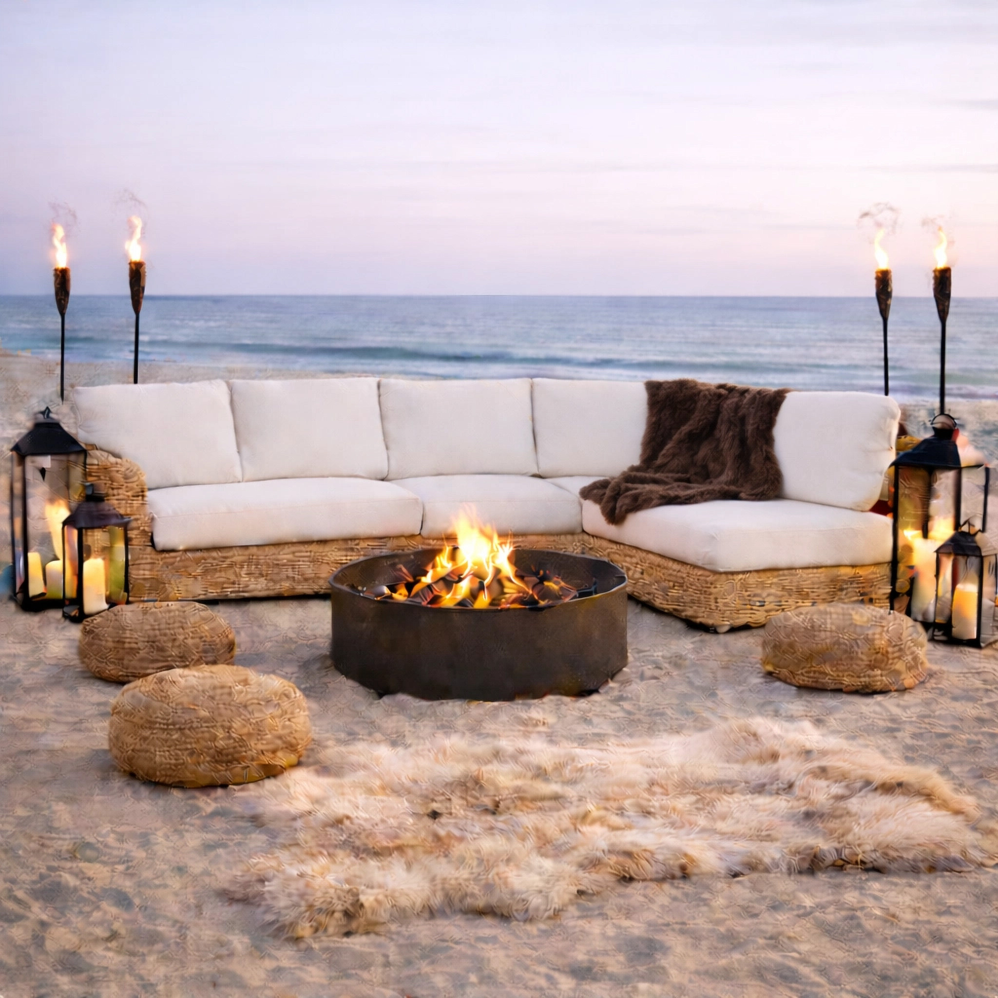 Professional, compliant beach campfire setup with a contained fire pit and raised base