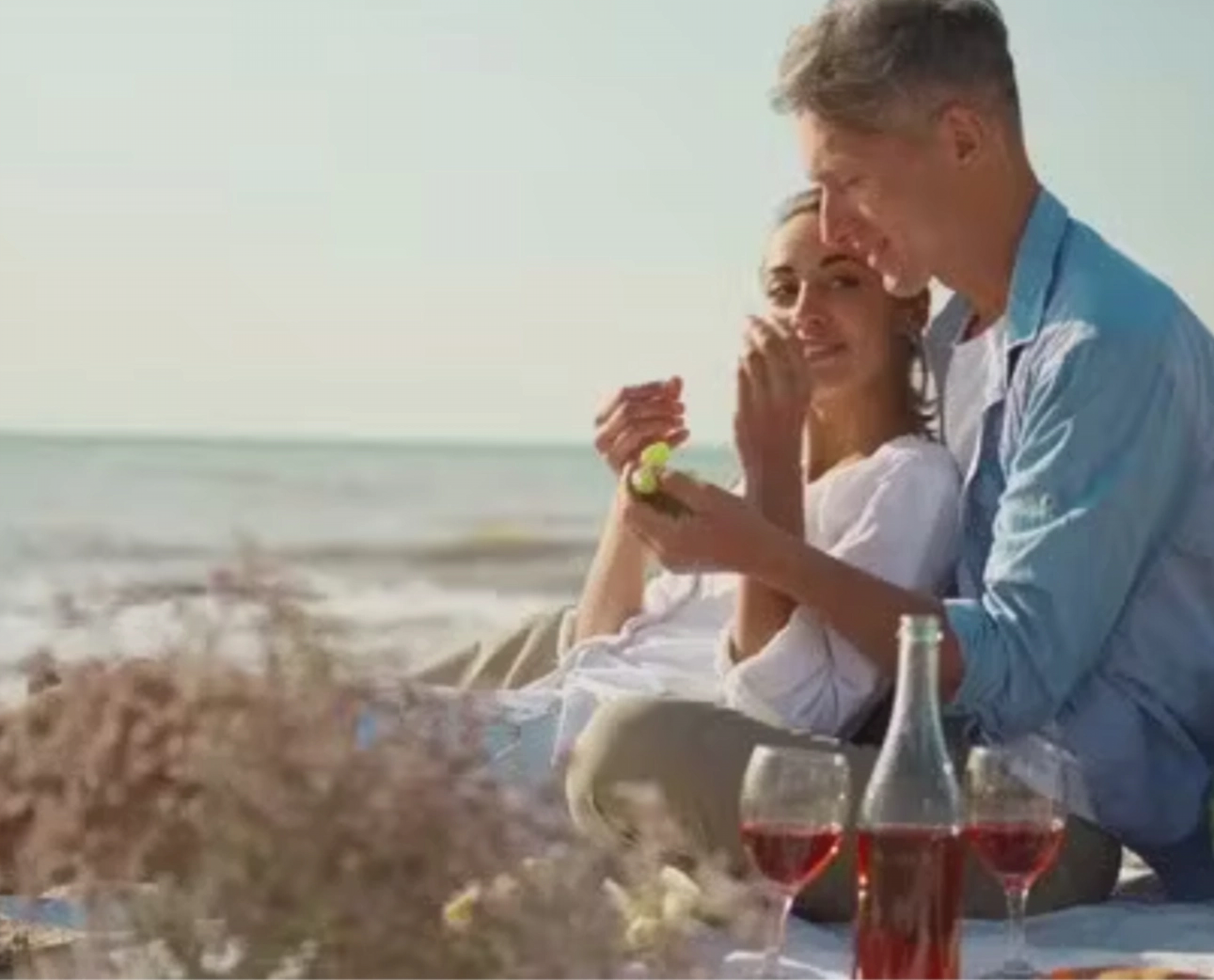 Date Night beach campfire with a professional, compliant fire pit on a raised base