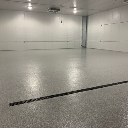before warehouse in Sacramento smoke flake epoxy floor