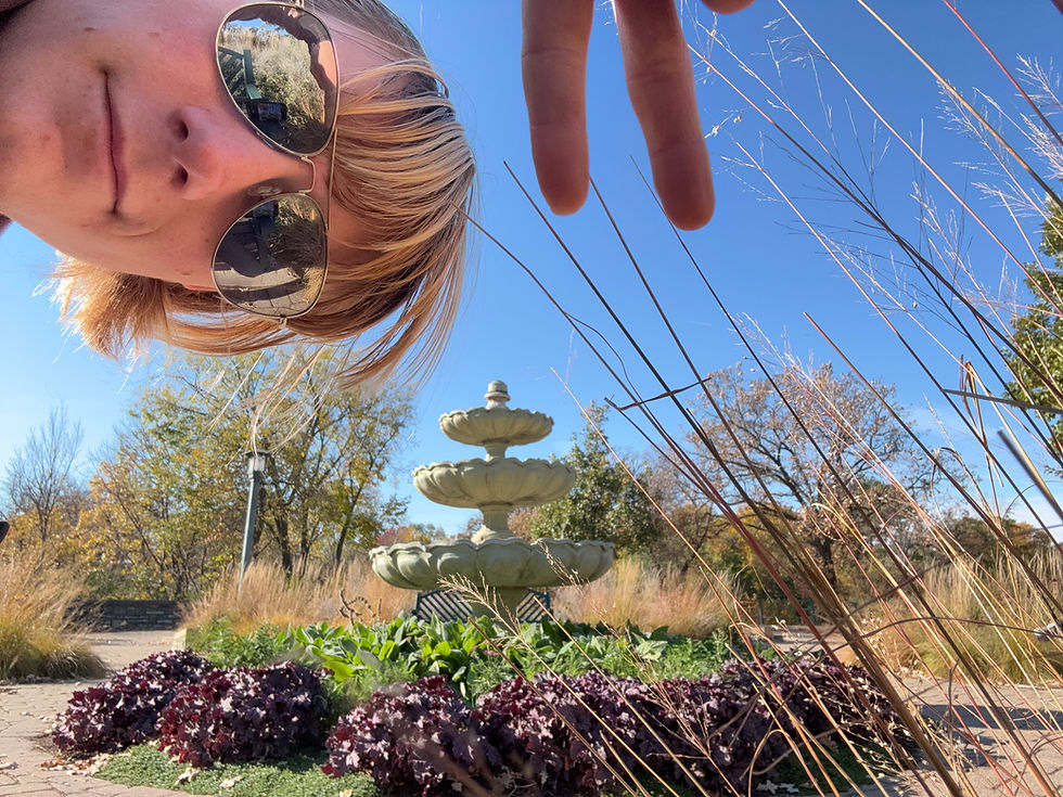 Trying to fit my face AND the fountain in the picture... It's certainly a picture, I guess.