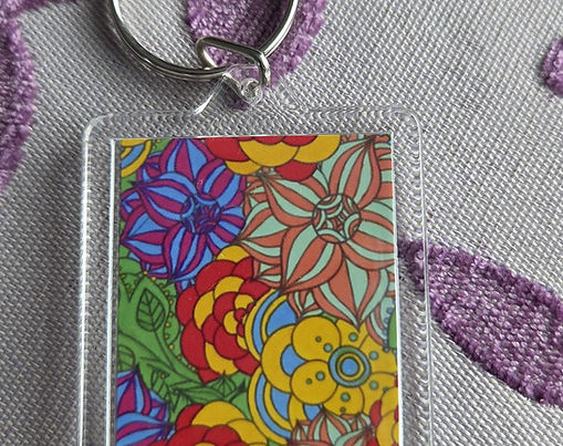 Unique 'Mandala Flowers 1' key ring in a multicoloured design.