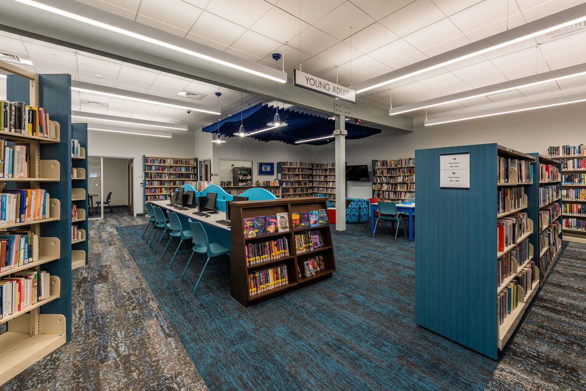 The Young Adult section at the Maury Loontjens Memorial Library provides a dedicated space for teens with comfortable seating, study areas, and a curated collection of books and digital resources.