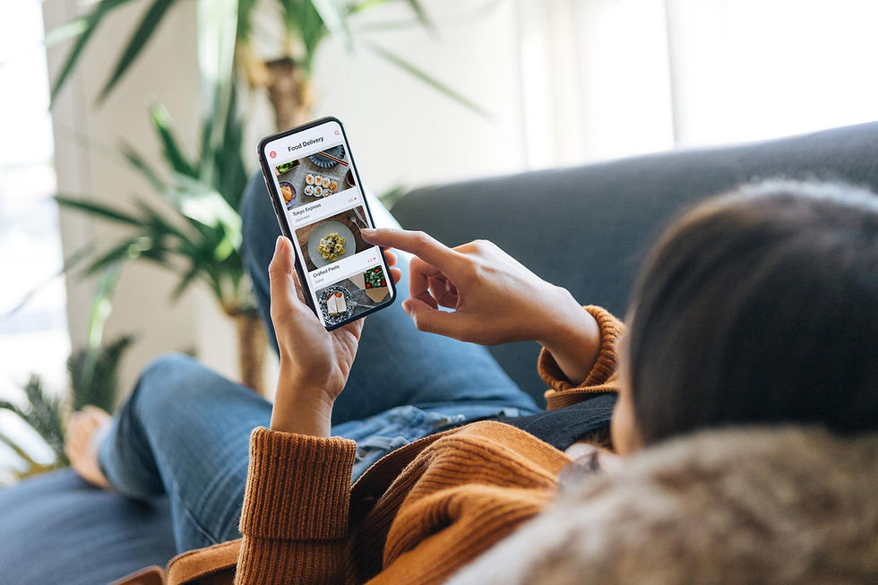 Consumer using a quick commerce app on a smartphone.