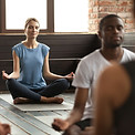 young-woman-group-people-sitting-sukhasana (1).jpg