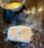 Next step in letter folding of dough.