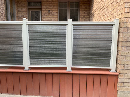 Custom wood deck with railing and outdoor seating area
