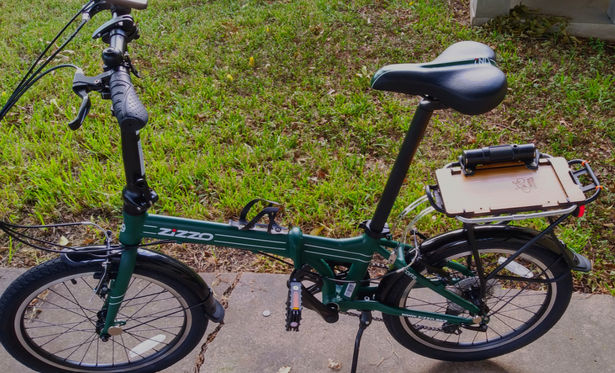 Green Z220 folding bike with accessories