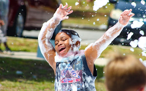 Boy having fun in foam