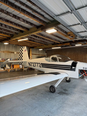 Small plane with aircraft wraps in a Dayton hangar