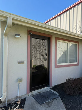 Commercial window tint in Dayton Cincinnati on glass door.