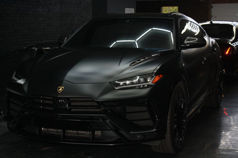Matte black vehicle wrap on a Lamborghini SUV in Dayton.