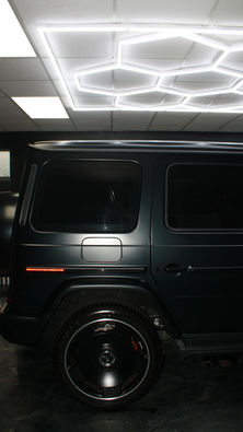 Stealth matte PPF paint protection film on a black SUV.