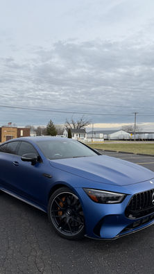 Stealth matte PPF paint protection film on a blue Mercedes.