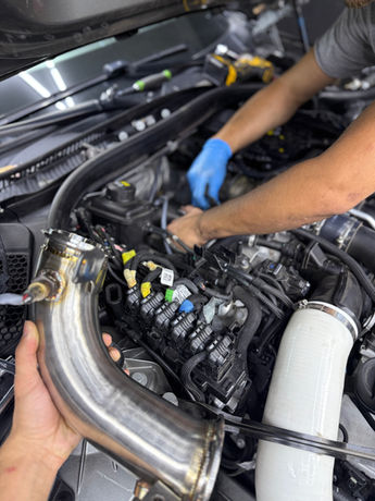Mechanic performing performance body upgrades in Dayton Cincinnati.