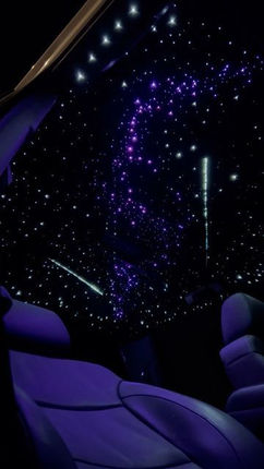 Custom auto lighting starlight in a car headliner.