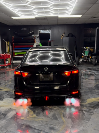 Performance body upgrades Dayton Cincinnati on a black car.