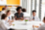 bigstock-Female-Teacher-With-Group-Of-H-261747673 (1).jpg