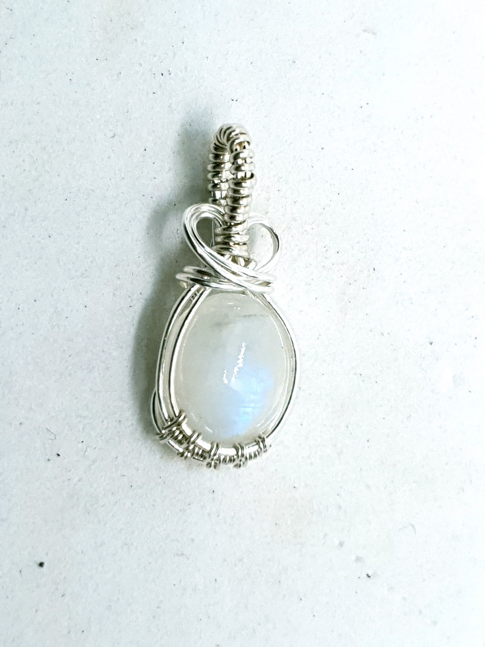 Thumbnail: Dainty moonstone hand woven silver pendant necklace
