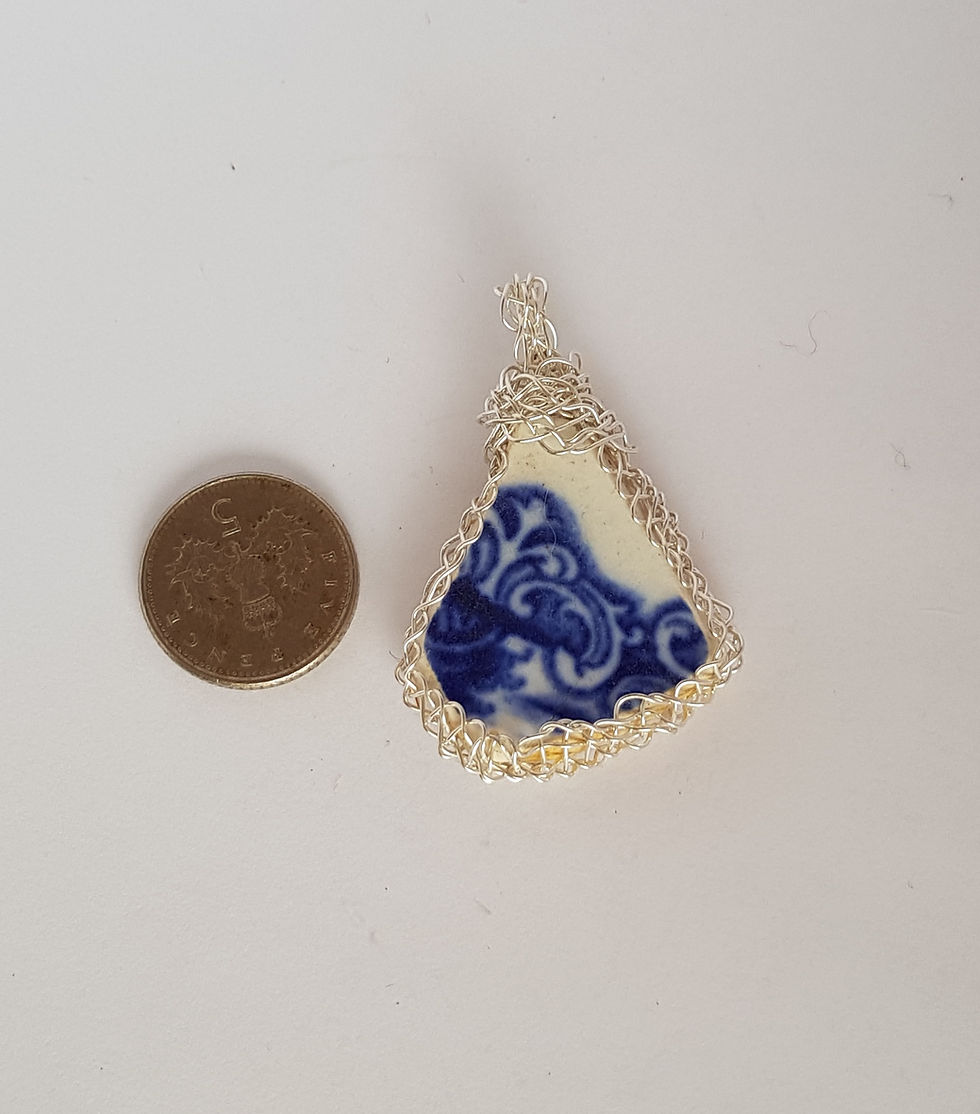 Thumbnail: Blue and white sea pottery pendant 