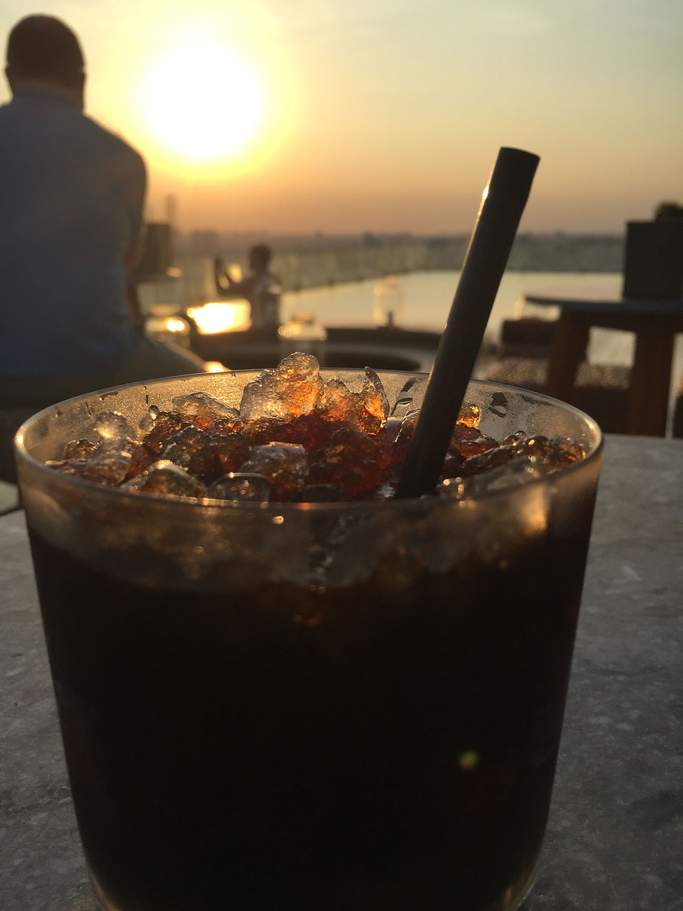 Drinking my ice coffee in the sunset in Ho Chi Minh City