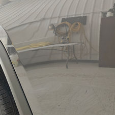 Close-up of 2025 Jeep Grand Cherokee rear door with custom rear impact PPF protection applied at APbyD Auto Protection in Red Deer