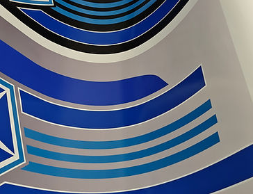 An image of a custom vinyl design being printed on a large format printer in water based ink