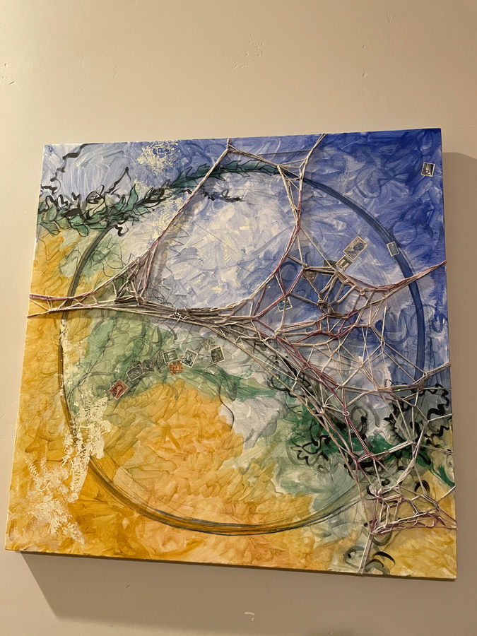 Abstract mixed media on gallery-wrapped canvas using Earth Paints, fibers, acrylic, ink, and vintage stamps. Yellows, greens and blues in abstract and expressive lines like the ocean, web, dragons