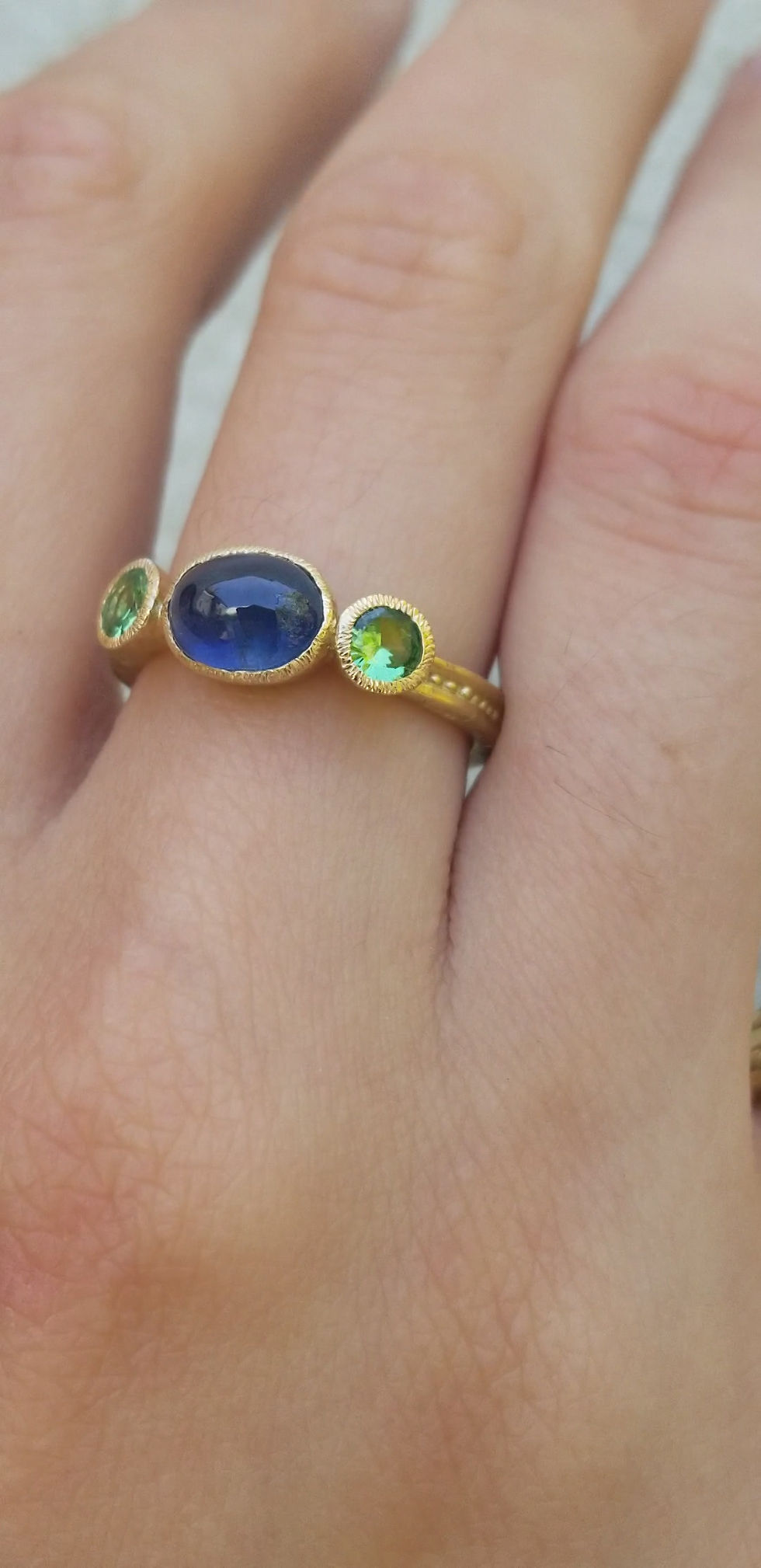 Thumbnail: Princess sapphire-garnet ring