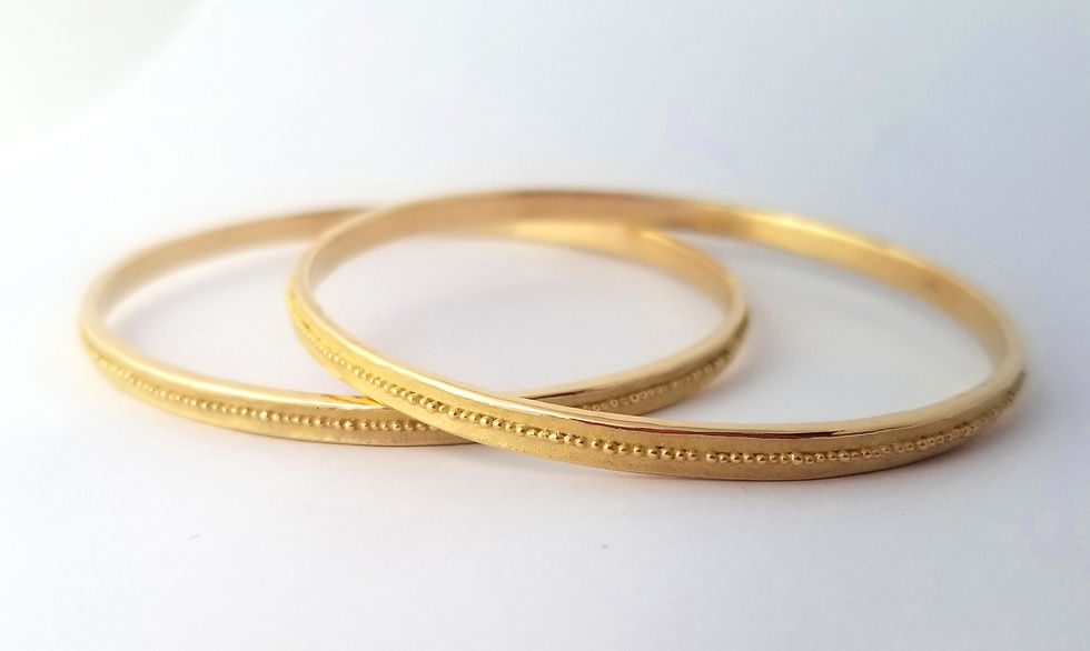 Thumbnail: gold bangle 