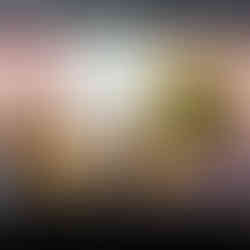 Amanda Wolfson on set during the MacKenzie-Childs x Wet Brush x Goody campaign shoot, reviewing the digital capture in a floral boudoir set of her own design.