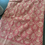 Thumbnail: Red with orange stripe border Enigmatic Floral Bridal Brocade Katan silk saree
