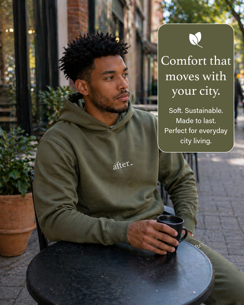 man having coffee on a cafe patio wearing his olive green comfies set