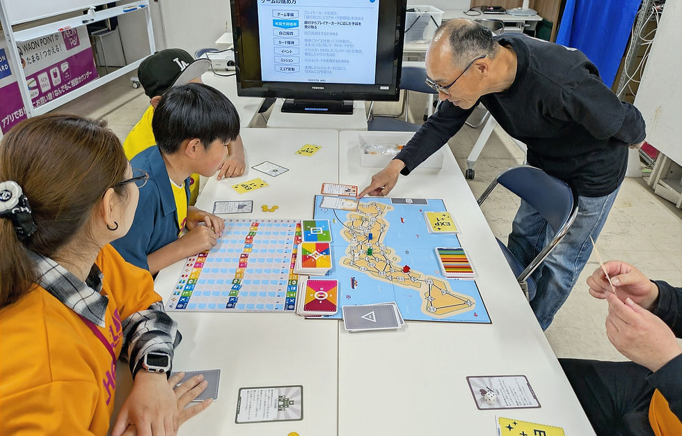 ひいたミッションカードの説明をきく参加者