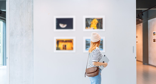 woman-visiting-art-gallery-her-looking-pictures-on-2025-02-09-22-35-47-utc.jpg
