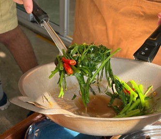 Preparation of Pad Pak Boong Fai Daeng with the correct technique applied