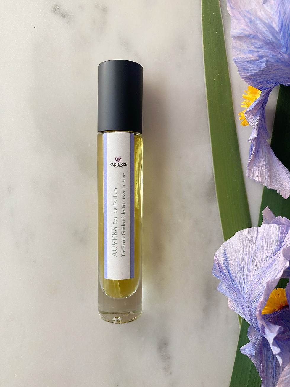Thumbnail: Travel-sized Auvers manuka eau de parfum on marble.