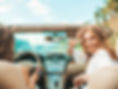 portrait two young beautiful smiling hipster female convertible car driving.jpg