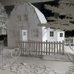 A detailed view of the papercraft house model from "Grains of Recollection," showcasing the fine art techniques of Studio McGuire - Davy and Kristin McGuire.