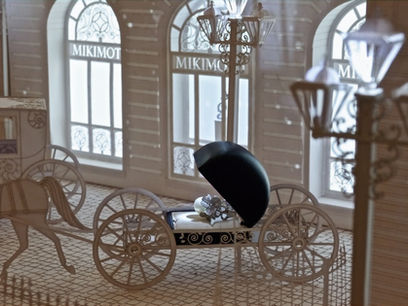A closeup of an exquisite papercraft horse and carriage carrying a beautiful Mikimoto pearl, from 'Precious Moments,' an installation by Studio McGuire at Mikimoto's flagship store in Ginza, Tokyo. Created by Studio McGuire - Davy and Kristin McGuire.
