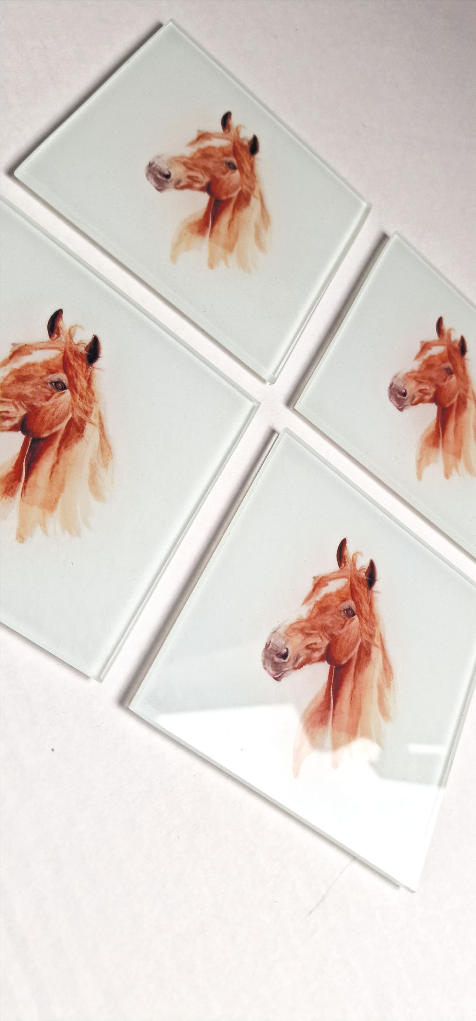Thumbnail: Set of four square glass coasters with a chestnut horse illustration by artist Emma Keys.