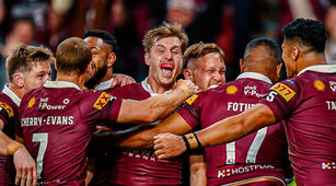 Cameron Munster celebrates with Queensland Maroons