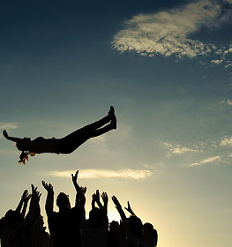 Group throwing girl in the air.jpg