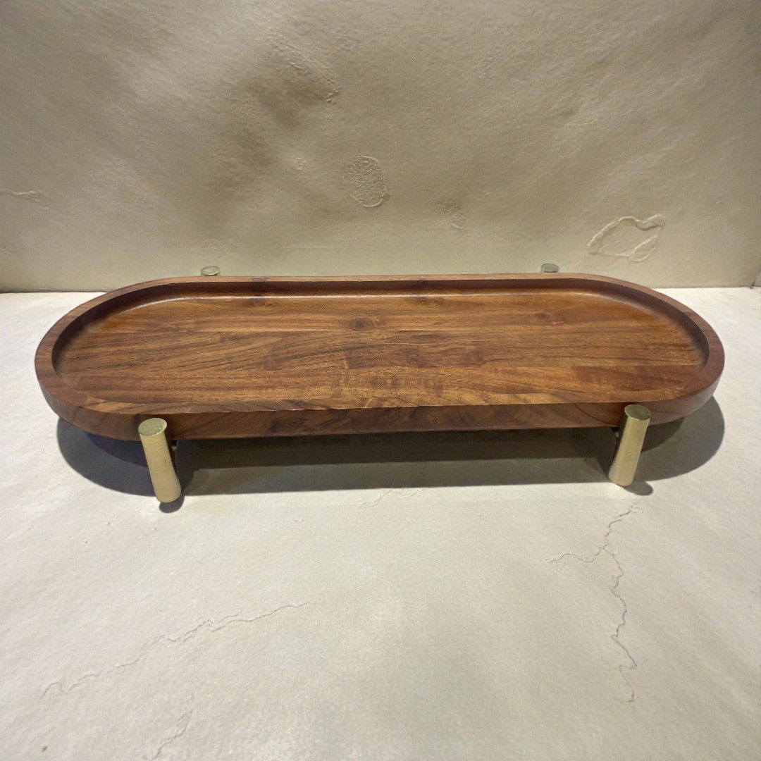Oval wood serving platter elevated with gold legs