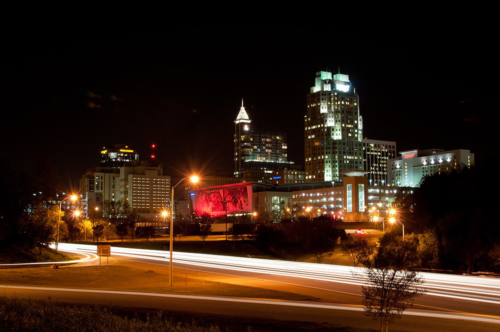 The Raleigh skyline at night