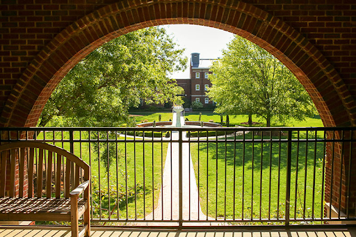 A view of Meredith's central campus from a breezeway between residence halls