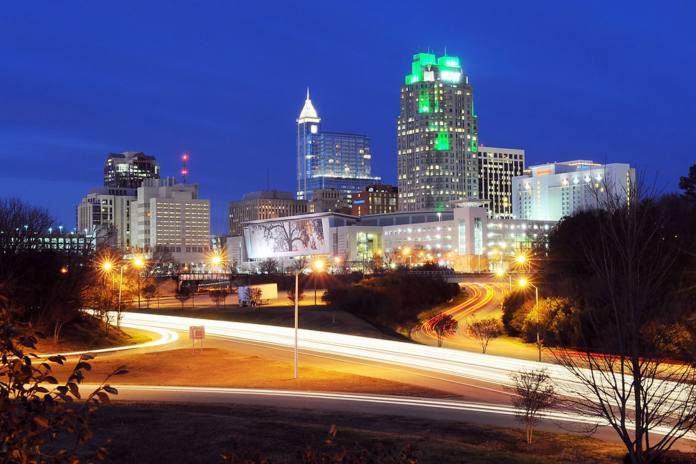 The Raleigh skyline at night